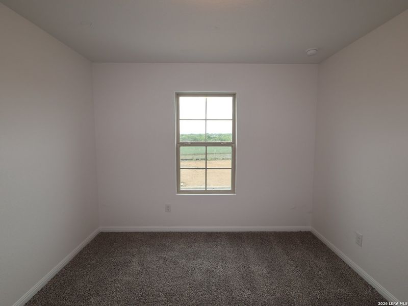 Spacious, unfurnished interior of a new home in Mesquite Ridge, San Antonio (Image 22).