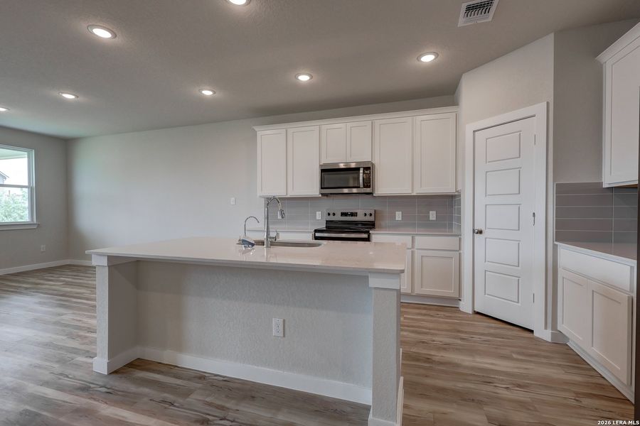 Furnished interior view inside a new home in Cinco Lakes, San Antonio (Image 9).