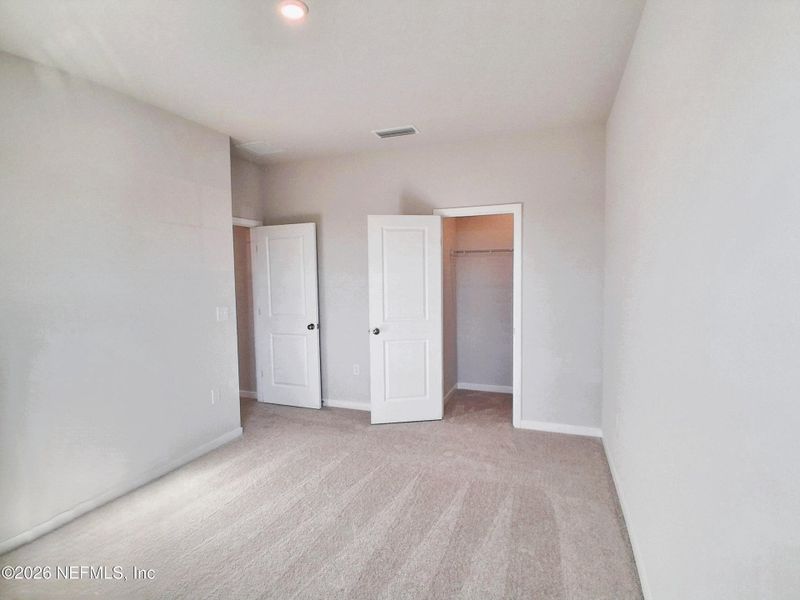 Spacious, unfurnished interior of a new home in Seminole Palms, Palm Coast (Image 17).