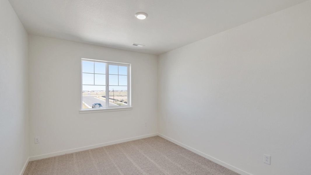 Spacious, unfurnished interior of a new home in The Ridge at Lorson Ranch, Colorado Springs (Image 12).
