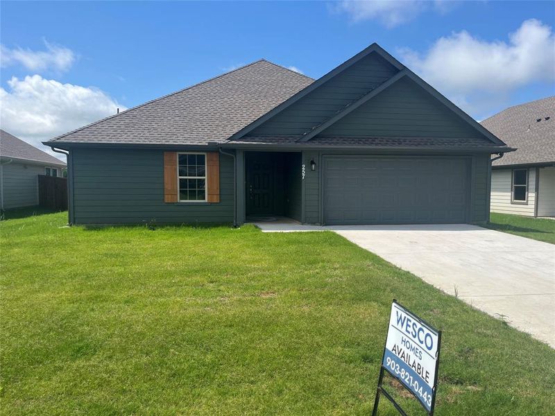 Front exterior of a new home in , Trenton, TX, highlighting curb appeal (Image 20). Front exterior of a new home in , Trenton, TX, highlighting curb appeal (Image 20).