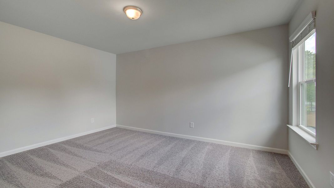 Representative furnished interior of a home built from the Emma by DRB Homes in Enclave at Evergreen, Fairburn (Image 27).