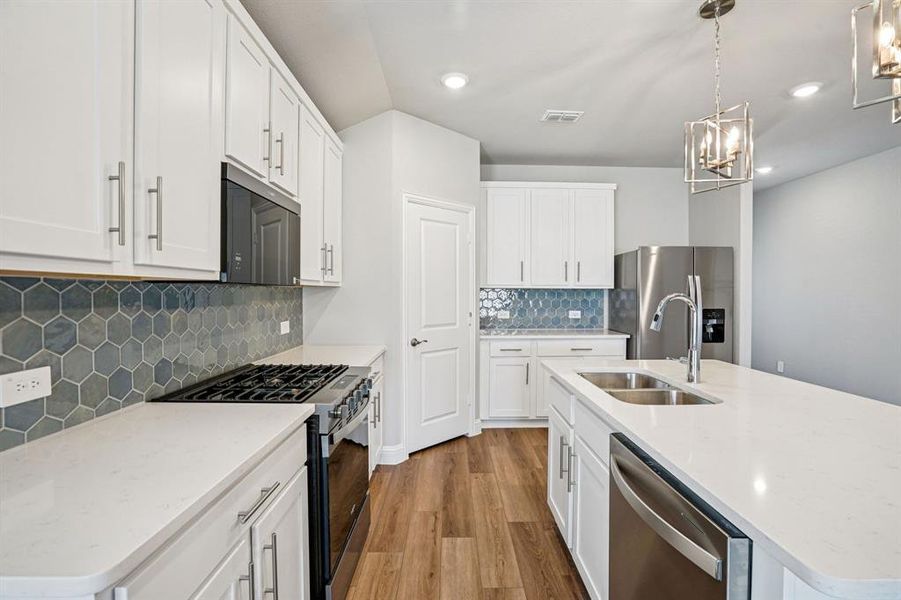 Photo is not of the actual home, but is an inspirational photo of builder’s model home and may depict options, furnishings, and/or decorator features that are not included.