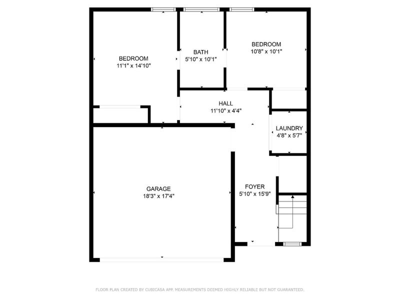 This floor plan features two bedrooms, a bathroom, and a central hallway. There's a laundry room conveniently located near the foyer. The spacious garage offers ample storage, and the layout is efficiently designed for easy movement throughout the home. This floor plan features two bedrooms, a bathroom, and a central hallway. There's a laundry room conveniently located near the foyer. The spacious garage offers ample storage, and the layout is efficiently designed for easy movement throughout the home.