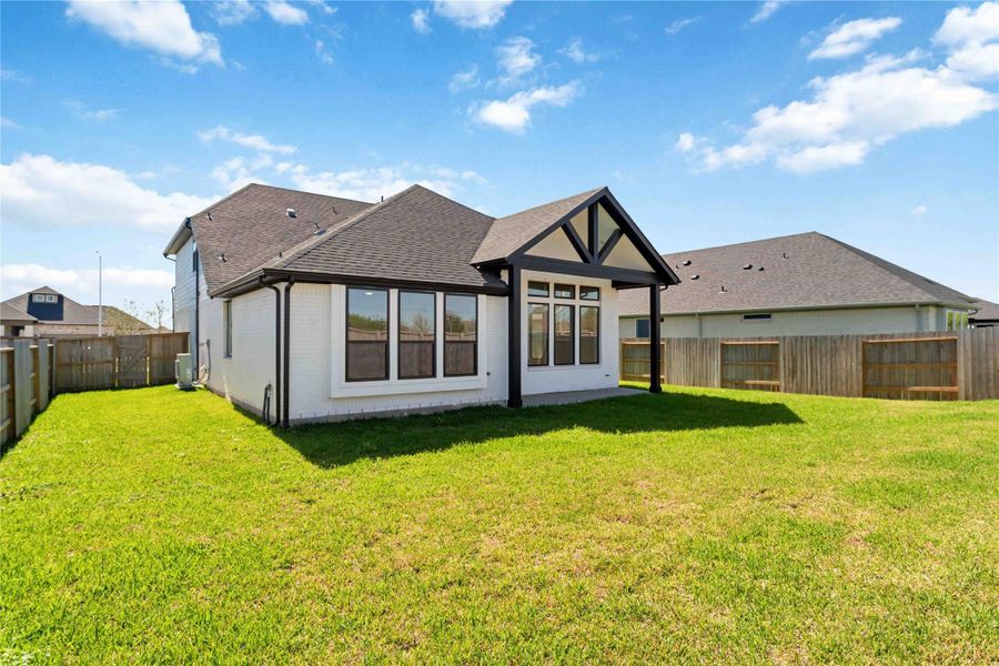 Exterior details and patio area of a home in Arabella on the Prairie, Richmond (Image 19).