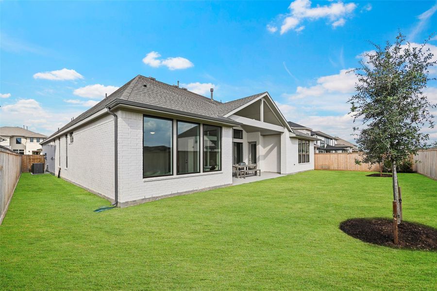 Exterior details and patio area of a home in Bridgeland 70′, Cypress (Image 24).