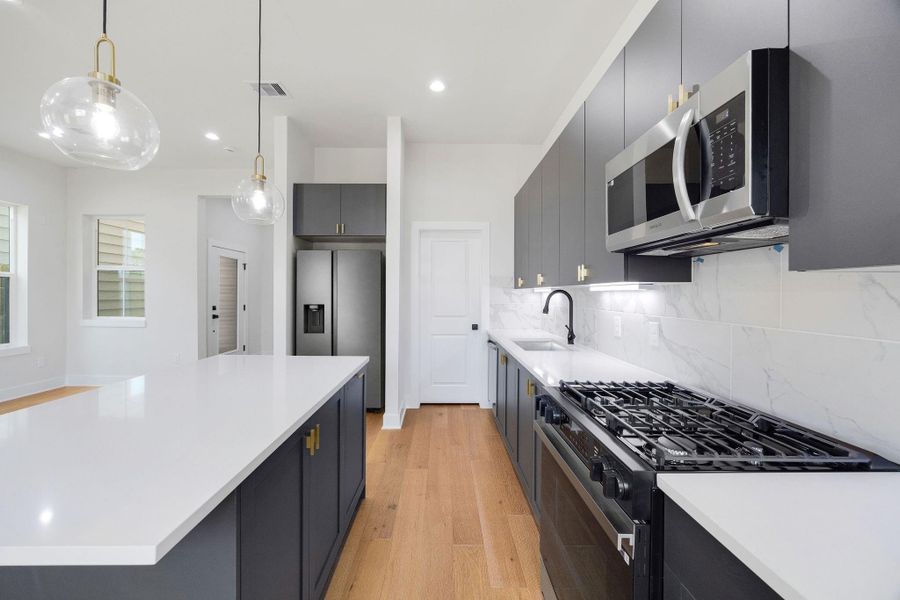 Gourmet kitchen with stainless steel appliances Gourmet kitchen with stainless steel appliances