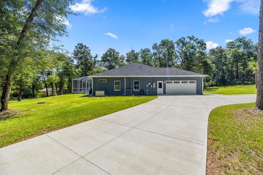 Front exterior of a new home in , Inverness, FL, highlighting curb appeal (Image 23). Front exterior of a new home in , Inverness, FL, highlighting curb appeal (Image 23).