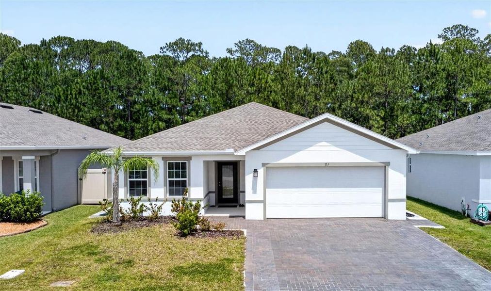 Front exterior of a new home in , Daytona Beach, FL, highlighting curb appeal (Image 25). Front exterior of a new home in , Daytona Beach, FL, highlighting curb appeal (Image 25).