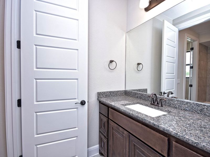 Representative furnished interior of a home built from the San Simeon I by Giddens Homes in Clearwater Ranch, Liberty Hill (Image 250).