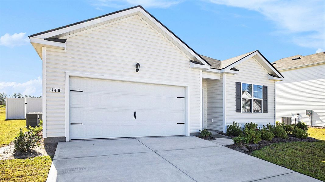 Front exterior of a new home in Eden Springs, Longs, SC, highlighting curb appeal (Image 19).