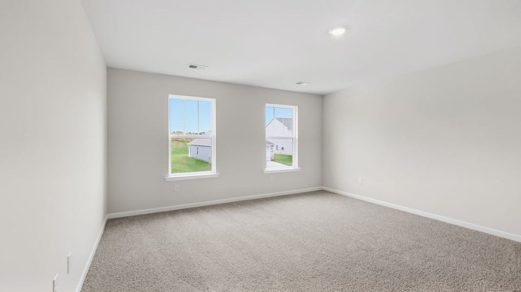Spacious, unfurnished interior of a new home in Durbin Meadows Traditions, Fountain Inn (Image 33).