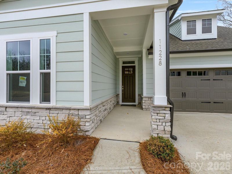 Exterior details and patio area of a home in North Creek Village, Huntersville (Image 3). Exterior details and patio area of a home in North Creek Village, Huntersville (Image 3).