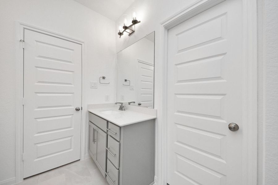 Furnished interior view inside a new home in Elyson, Katy (Image 9).