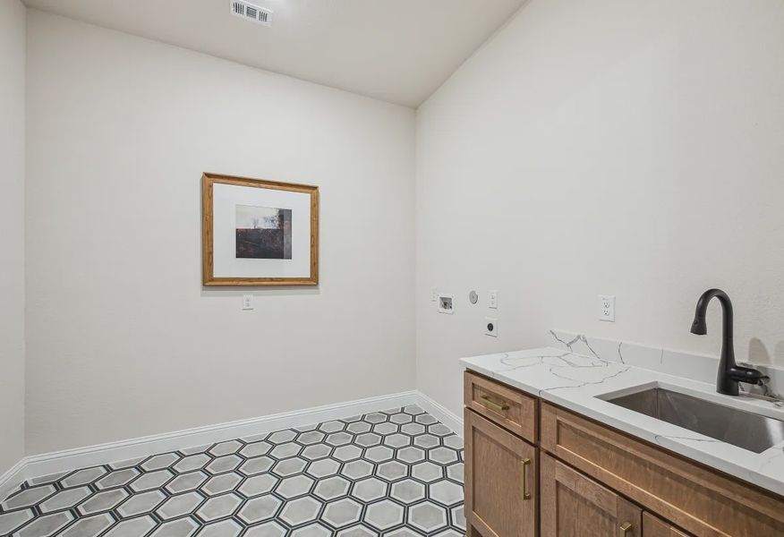 Plan 5042 laundry room - staged - 12 of 20