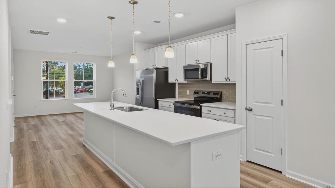 Furnished interior view inside a new home in Clear Springs Townhomes, North Charleston (Image 5).