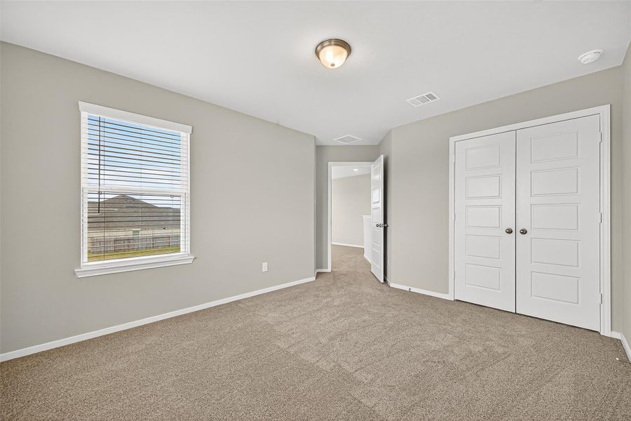 Spacious, unfurnished interior of a new home in Sunterra, Katy (Image 25).