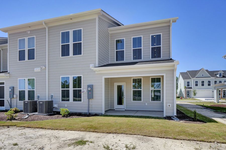 Front exterior of a new home in Grand Park, Leland, NC, highlighting curb appeal (Image 16).