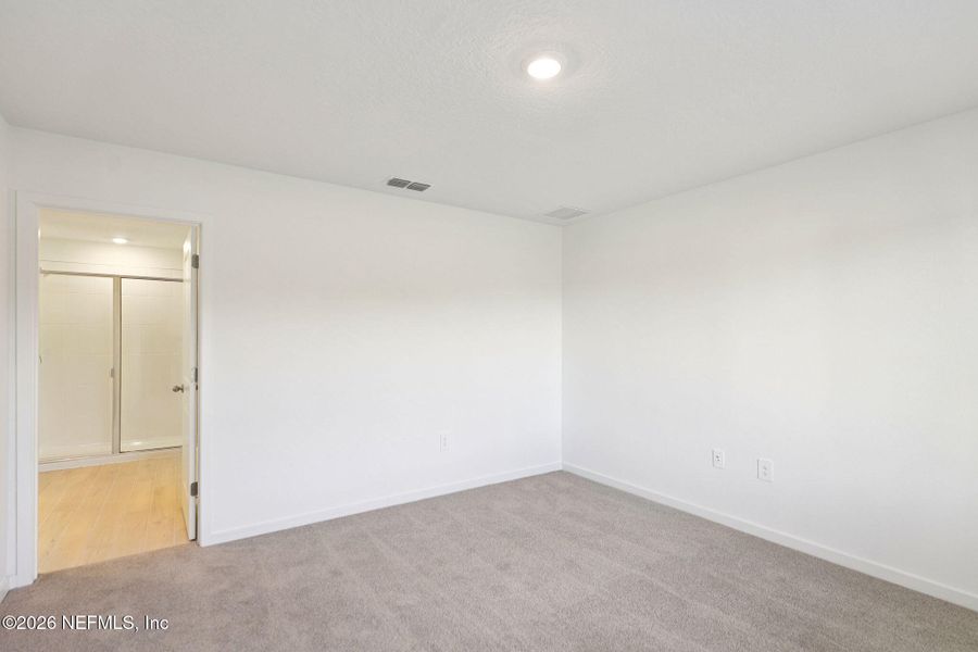 Spacious, unfurnished interior of a new home in Flagler Village - Signature Series, Palm Coast (Image 18).