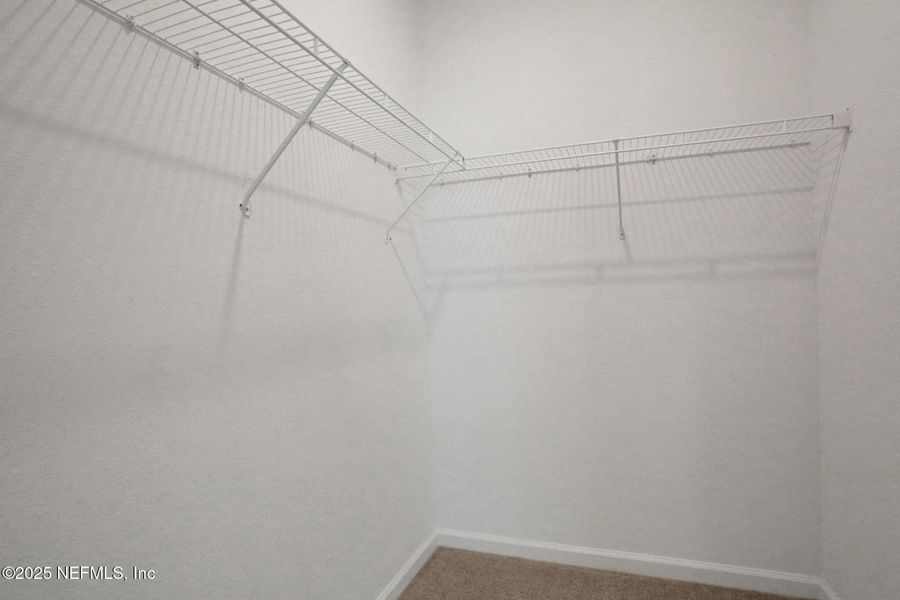 Spacious, unfurnished interior of a new home in TrailMark, St. Augustine (Image 24).