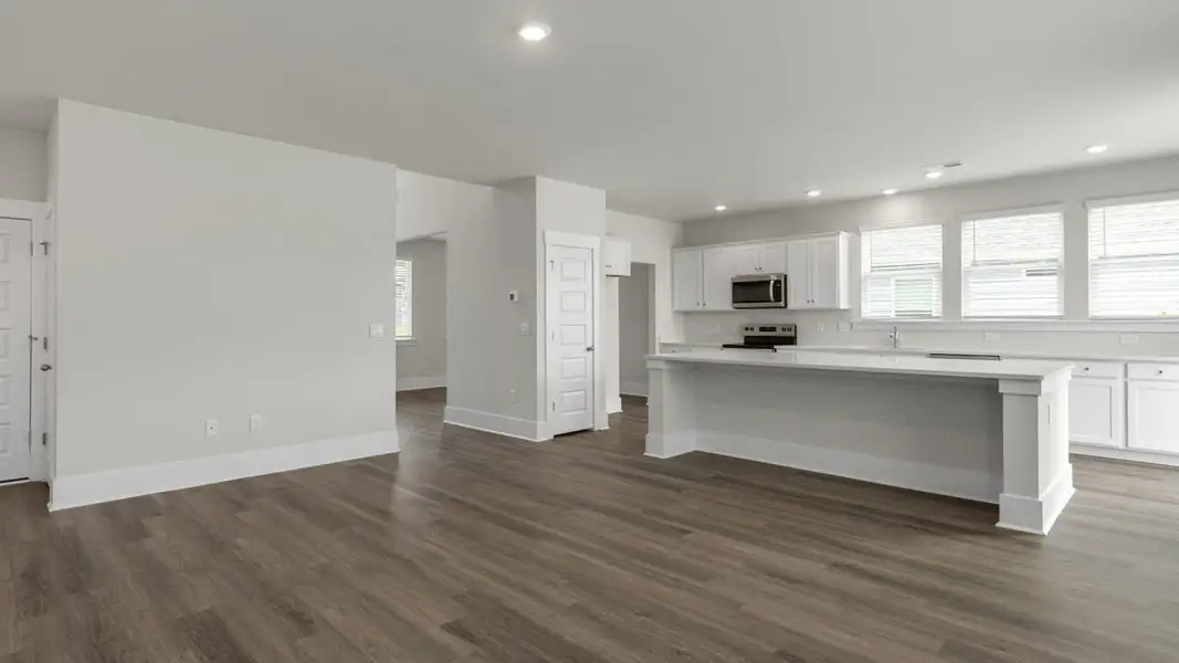 Spacious, unfurnished interior of a new home in The Highlands at Cedar Hill Landing, Navassa (Image 13).