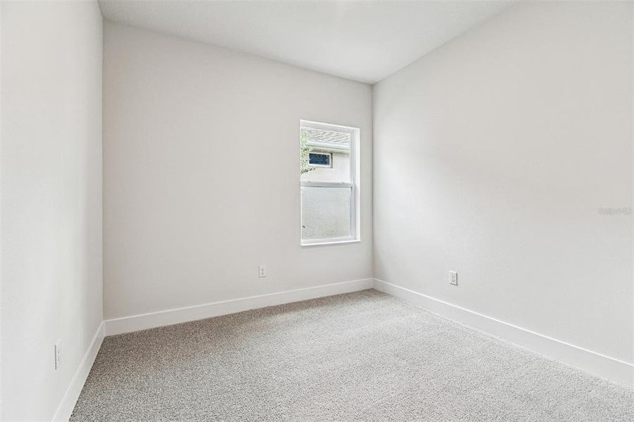 Spacious, unfurnished interior of a new home in The Peninsula at Rhodine Lake, Riverview (Image 30).