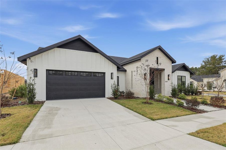 Front exterior of a new home in , Gainesville, FL, highlighting curb appeal (Image 25).