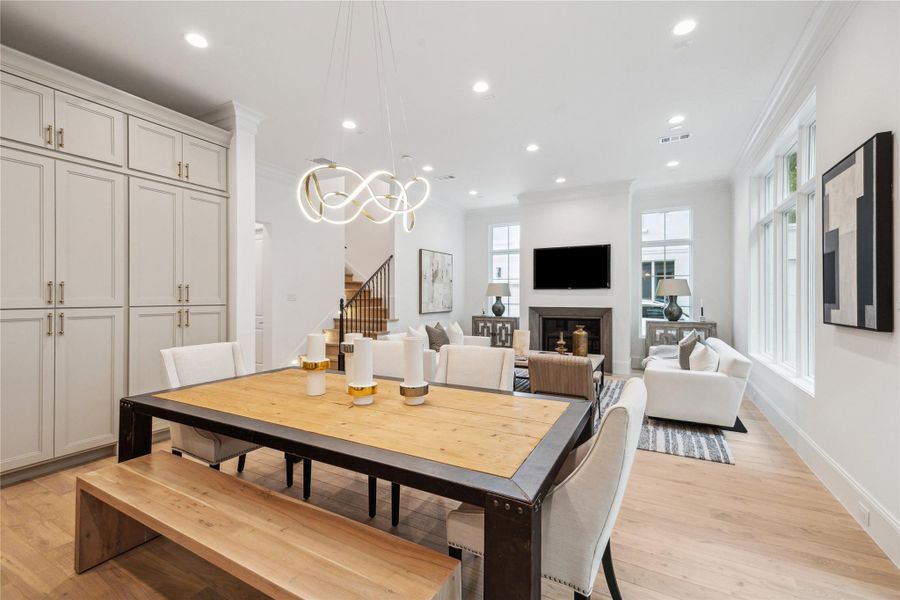 Dining space is located directly off of the living. Ample windows and a set of french doors fill this space with light. Dining space is located directly off of the living. Ample windows and a set of french doors fill this space with light.