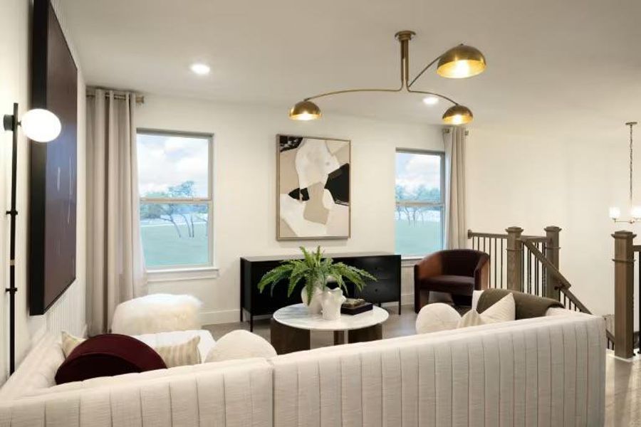 Photo of Pulte model home with same floor plan, not of actual home listed.