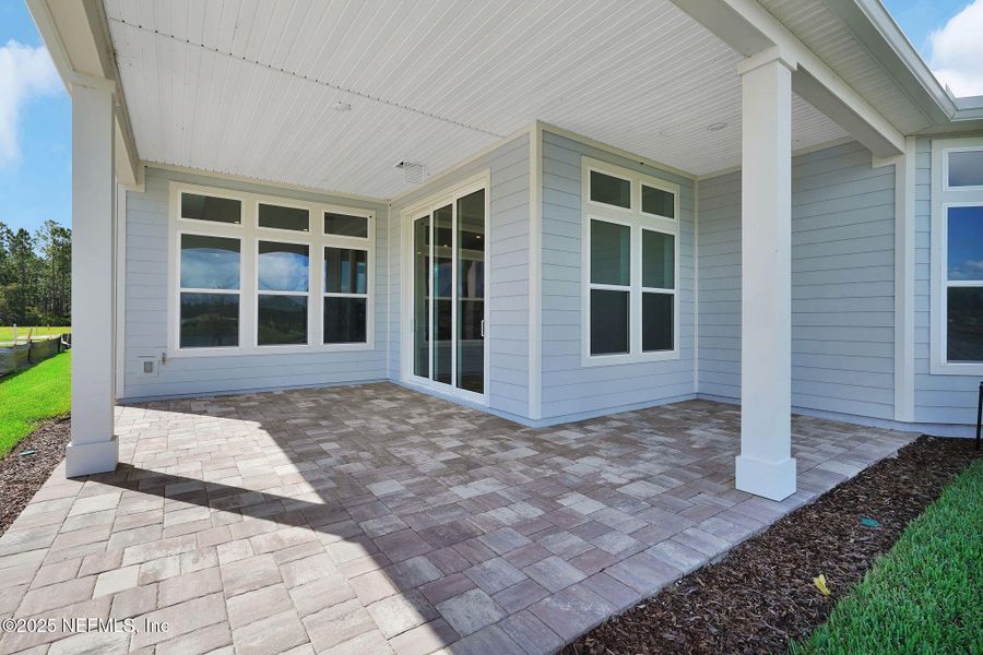 Front exterior of a new home in Del Webb Saint Johns, St. Johns, FL, highlighting curb appeal (Image 18).