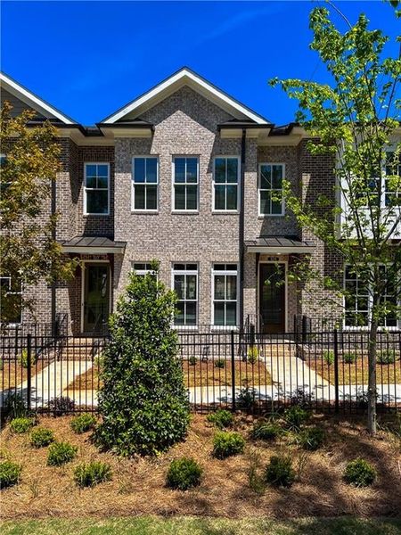 3 level Townhome with All Brick exteriors!