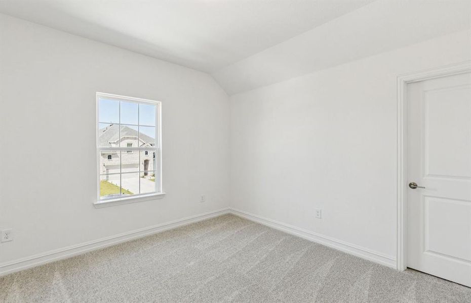 Spacious secondary bedroom with large windows Spacious secondary bedroom with large windows