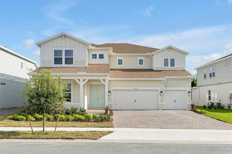 Front exterior of a new home in , Orlando, FL, highlighting curb appeal (Image 24). Front exterior of a new home in , Orlando, FL, highlighting curb appeal (Image 24).