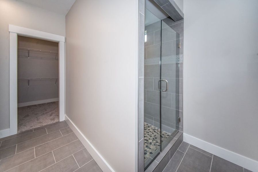 Representative unfurnished interior of a home built from the Beaumont Elite by Enchanted Homes in Pointe Summit, Slater-Marietta (Image 56).