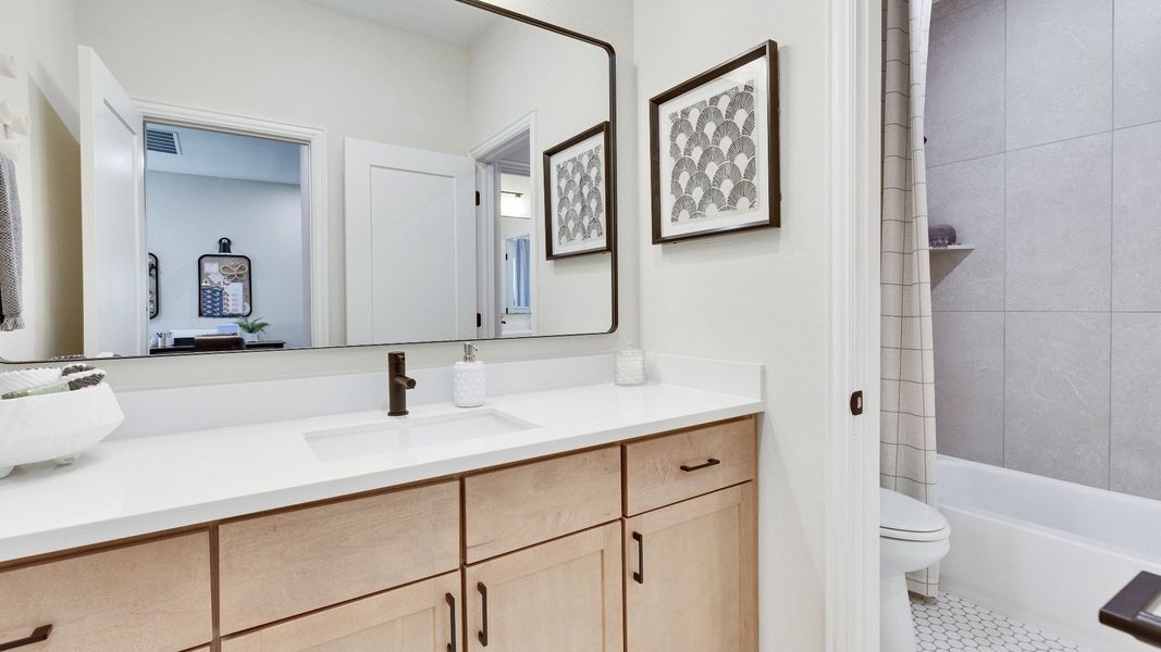 Representative furnished interior of a home built from the Elm by Brightland Homes in Southern Pointe, College Station (Image 16). Representative furnished interior of a home built from the Elm by Brightland Homes in Southern Pointe, College Station (Image 16).