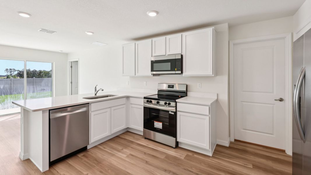 Representative furnished interior of a home built from the DAKOTA by D.R. Horton in Marion County Spot Lots, Ocala (Image 13).