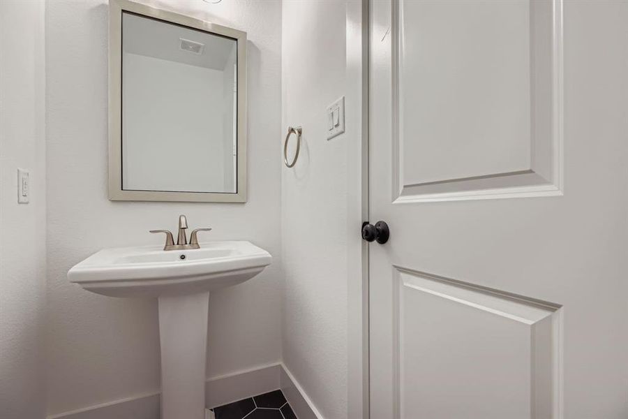 Bathroom with baseboards Bathroom with baseboards