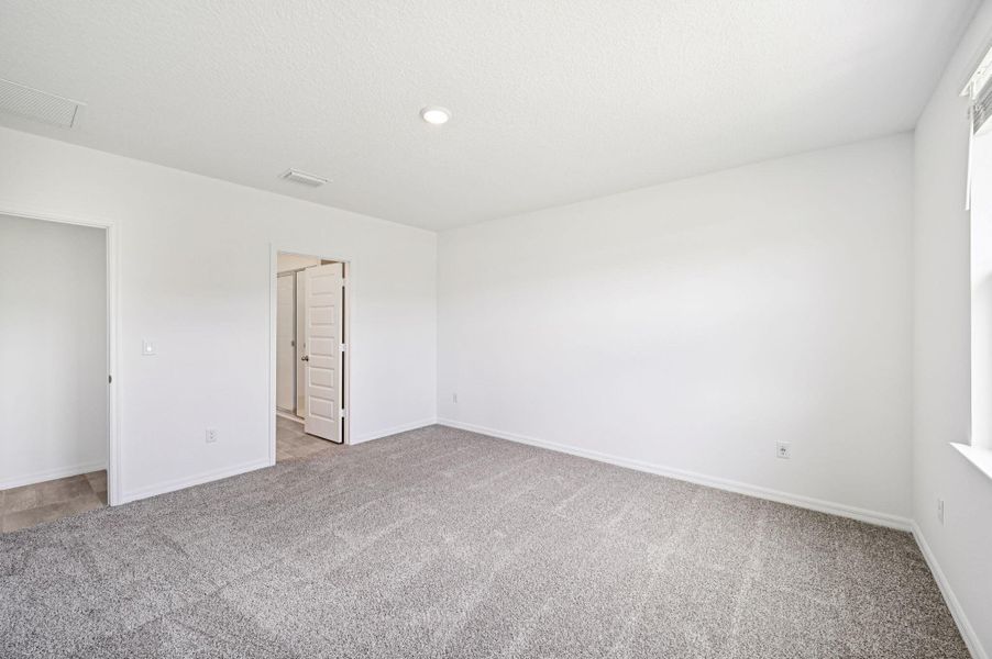 Spacious, unfurnished interior of a new home in Hampton Park - Classic Series, Vero Beach (Image 25).