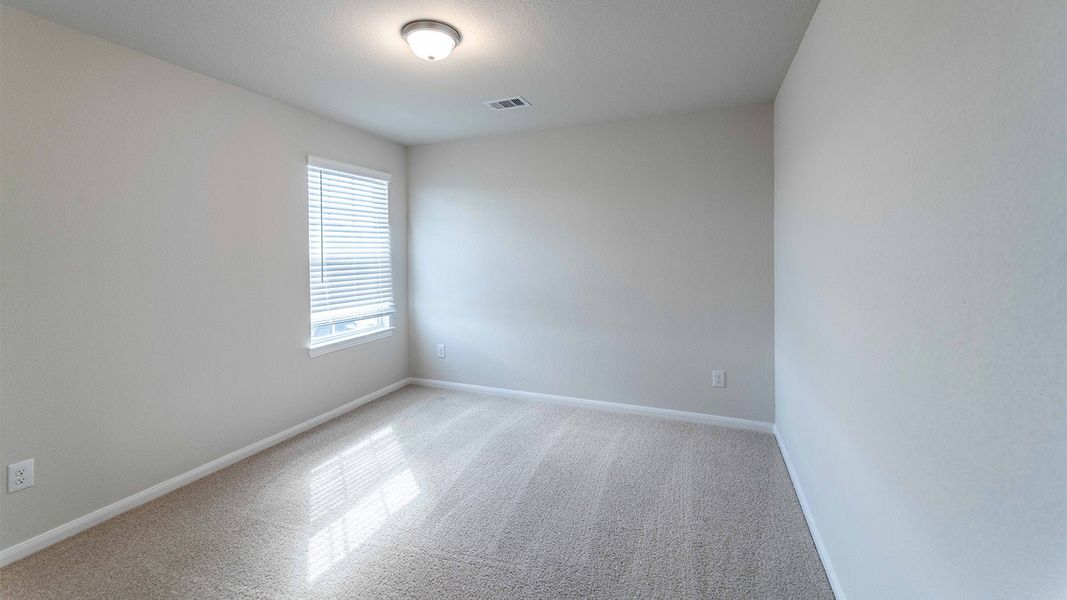 Spacious, unfurnished interior of a new home in The Canopies, Splendora (Image 28).