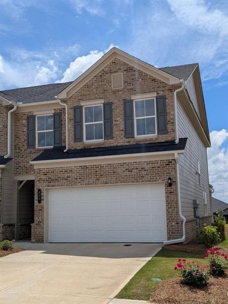Front exterior of a new home in Alcovy Meadows, Dacula, GA, highlighting curb appeal (Image 7). Front exterior of a new home in Alcovy Meadows, Dacula, GA, highlighting curb appeal (Image 7).