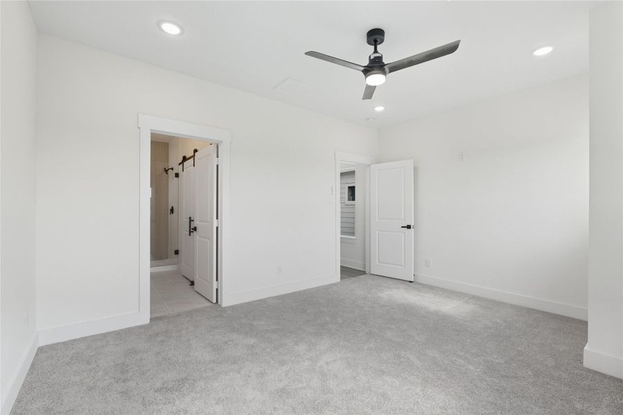 Another view of the primary room that showcase the perfect flow and layout this space has to offer.