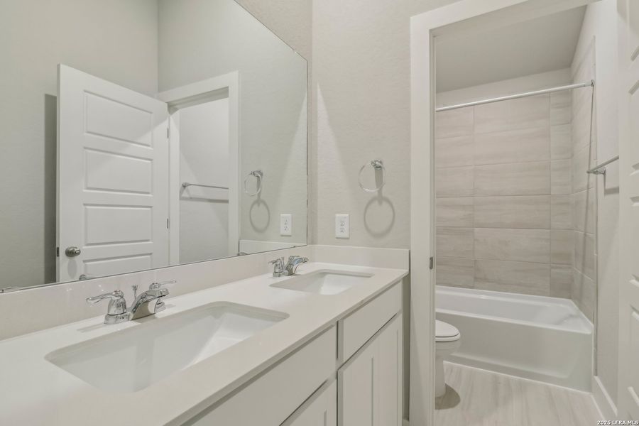 Furnished interior view inside a new home in Fox Falls, Boerne (Image 11).