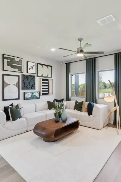 Living Room in the Magnolia home plan by Trophy Signature Homes – REPRESENTATIVE PHOTO Living Room in the Magnolia home plan by Trophy Signature Homes – REPRESENTATIVE PHOTO