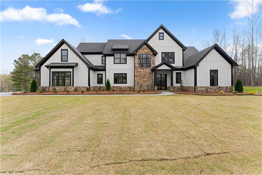 Front exterior of a new home in , Ball Ground, GA, highlighting curb appeal (Image 27).
