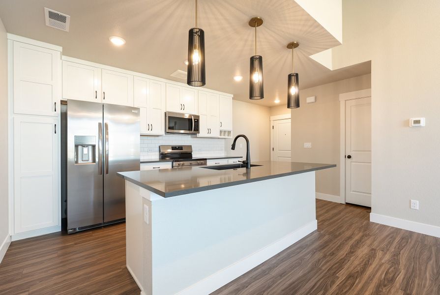Furnished interior view inside a new home in The Lakes at Centerra, Loveland (Image 2).