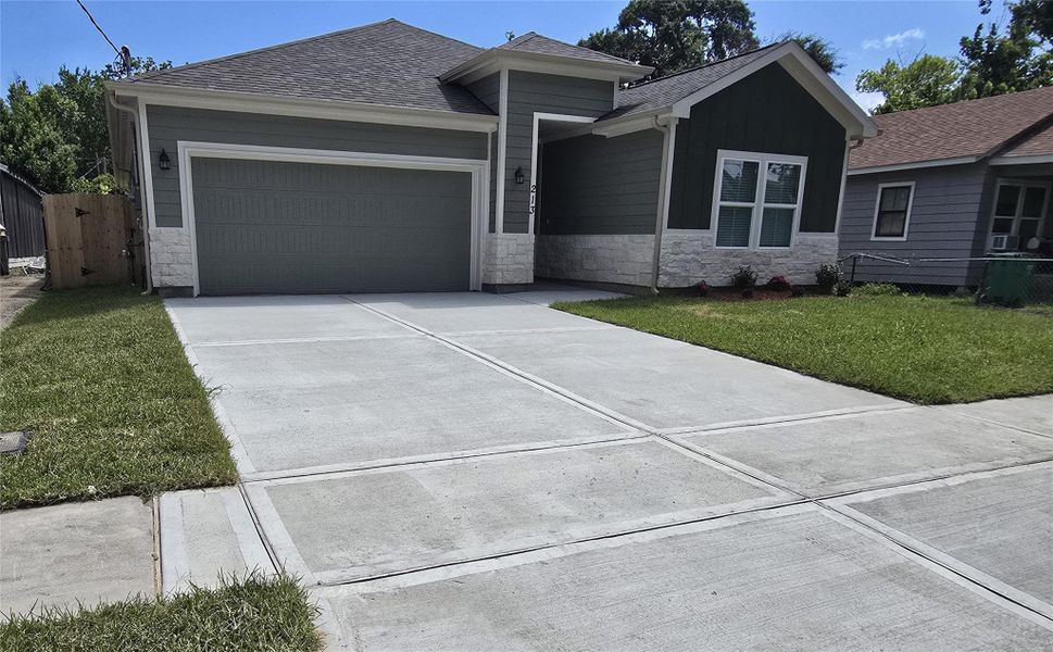 Front exterior of a new home in , Baytown, TX, highlighting curb appeal (Image 2). Front exterior of a new home in , Baytown, TX, highlighting curb appeal (Image 2).