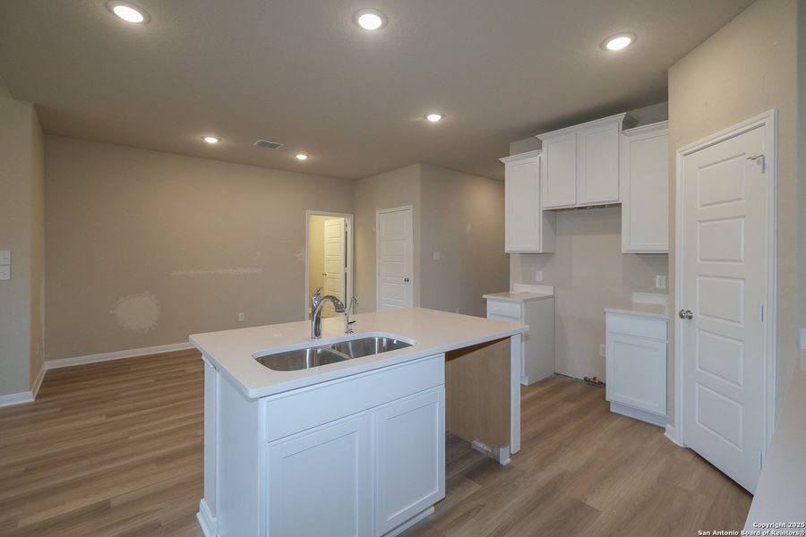 Furnished interior view inside a new home in Hunters Ranch, San Antonio (Image 6).
