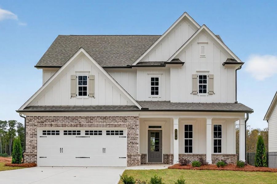 Front exterior of a new home in Hemingway, Flowery Branch, GA, highlighting curb appeal (Image 1). Front exterior of a new home in Hemingway, Flowery Branch, GA, highlighting curb appeal (Image 1).