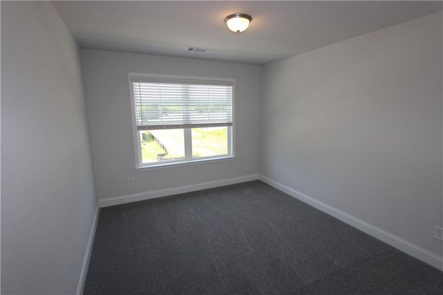 Spacious, unfurnished interior of a new home in Clark Farms, Flowery Branch (Image 25).