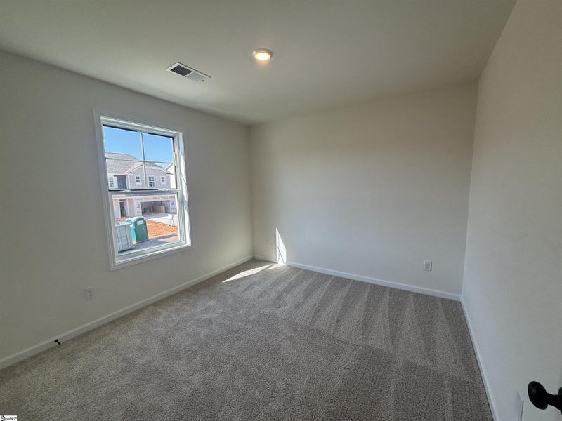 Spacious, unfurnished interior of a new home in Halton Oaks, Spartanburg (Image 21).